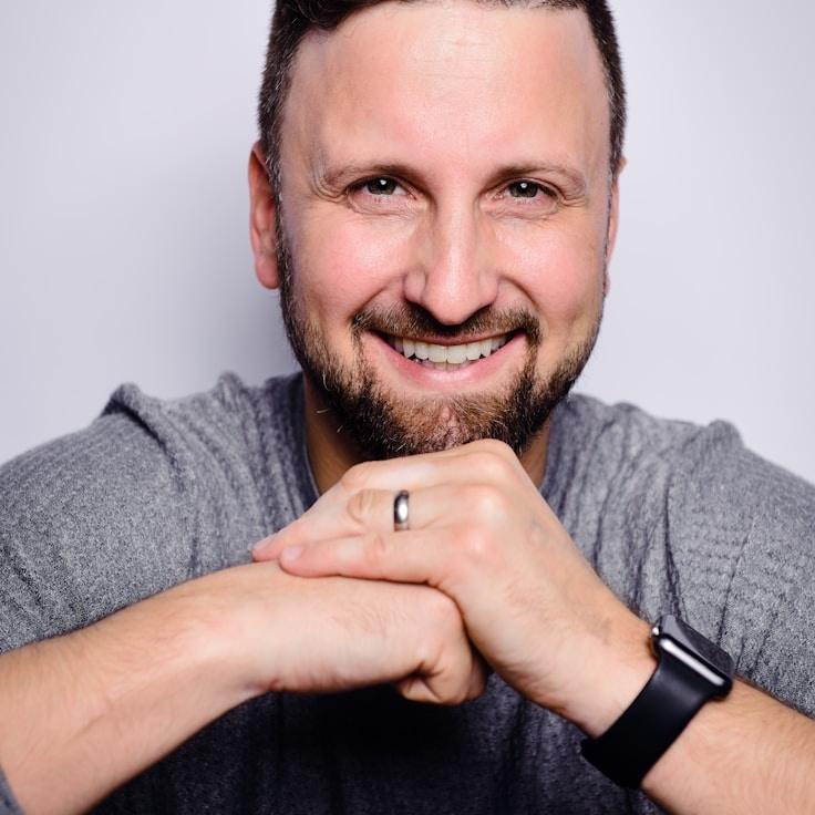 Jordan Reed, Client Relations Director, discussing corporate gifting strategy with business clients